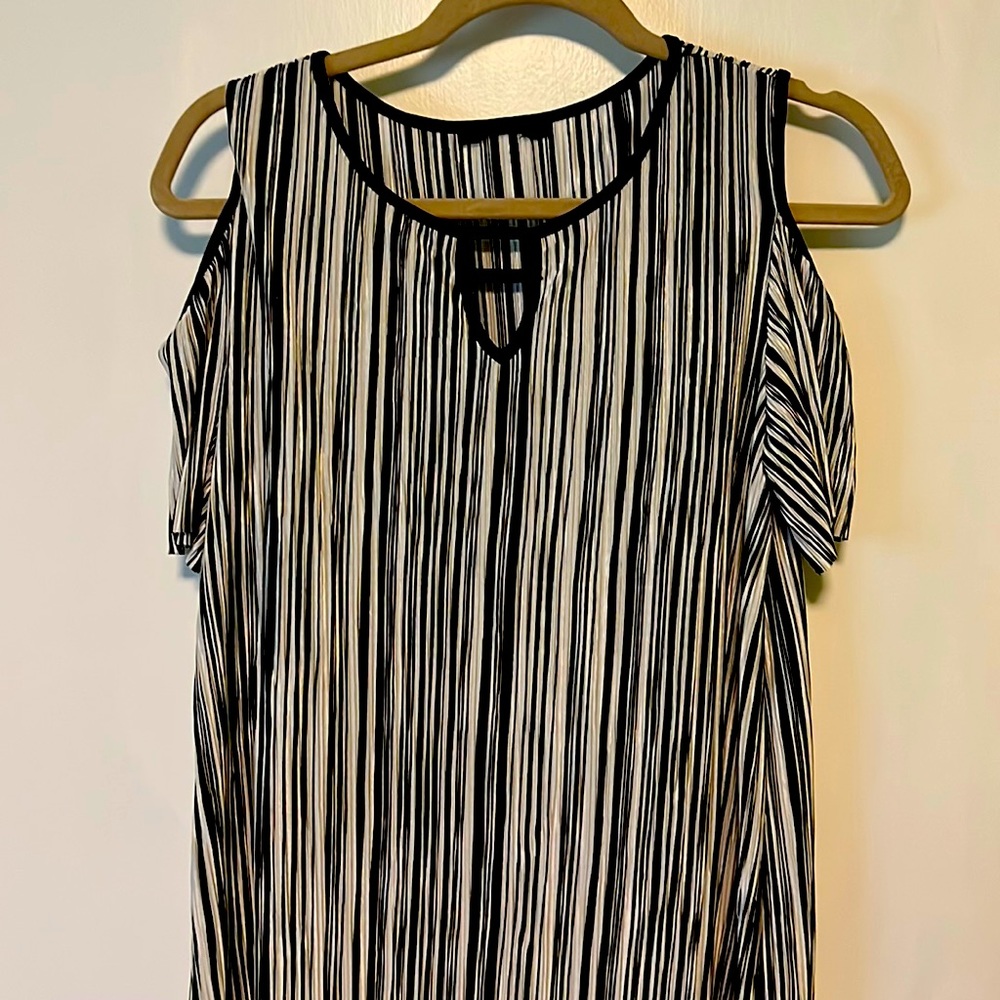 Jennie and Marlis short sleeved, cold shoulder, black and white striped top.